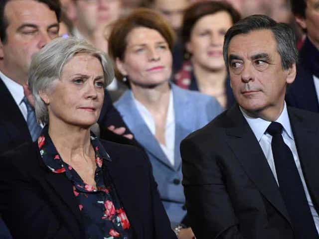 Francois Fillon, right, and Penelope Fillon, left, attend a campaign rally in Paris back in 29 January 2017