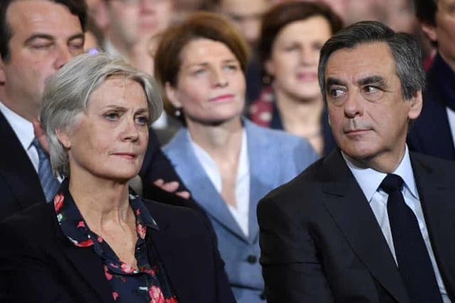 Francois Fillon, right, and Penelope Fillon, left, attend a campaign rally in Paris back in 29 January 2017