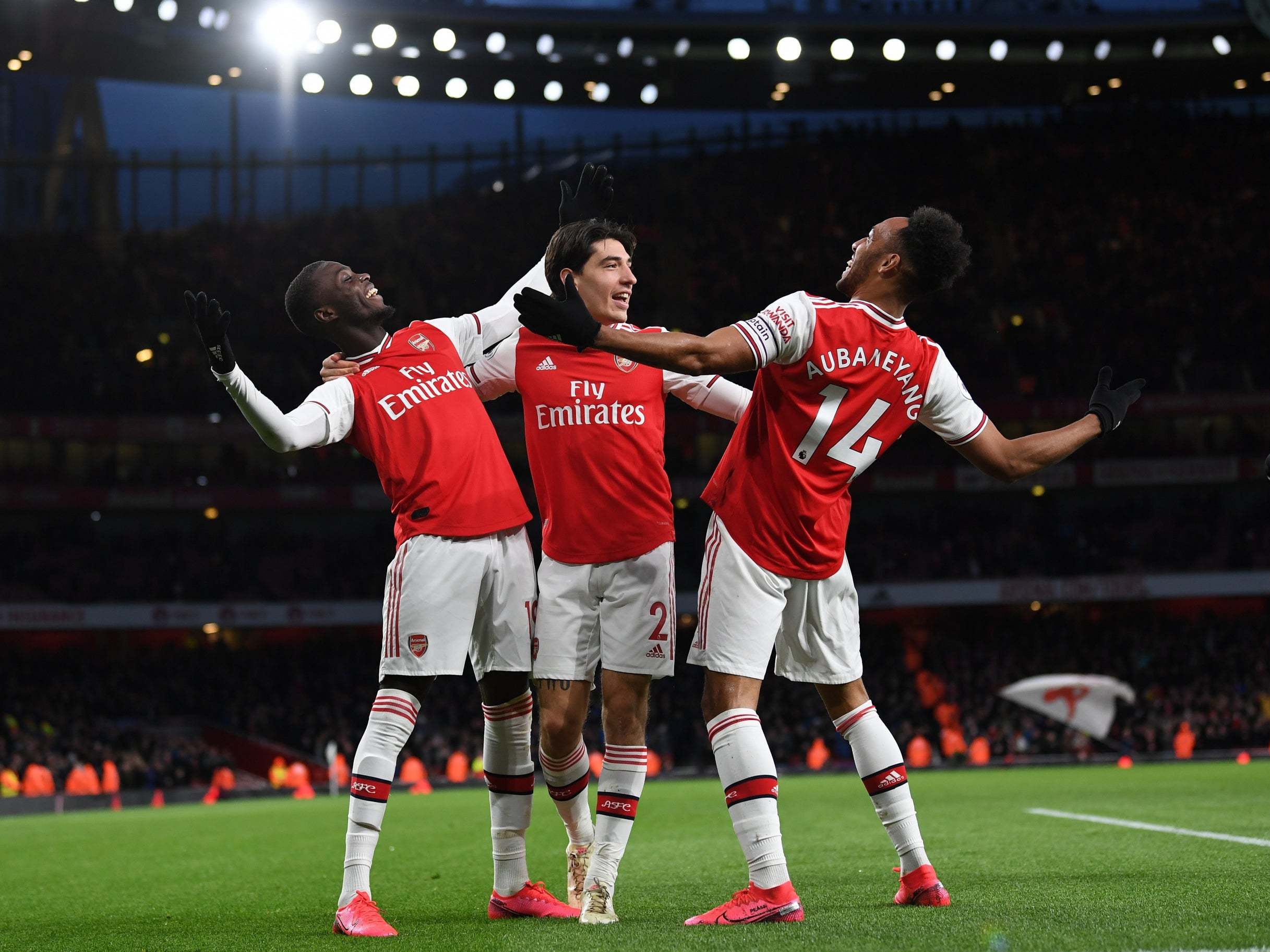 Pierre-Emerick Aubameyang, right, celebrates scoring Arsenal's third