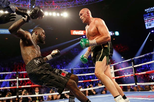 Tyson Fury stopped Deontay Wilder in the seventh round in Las Vegas