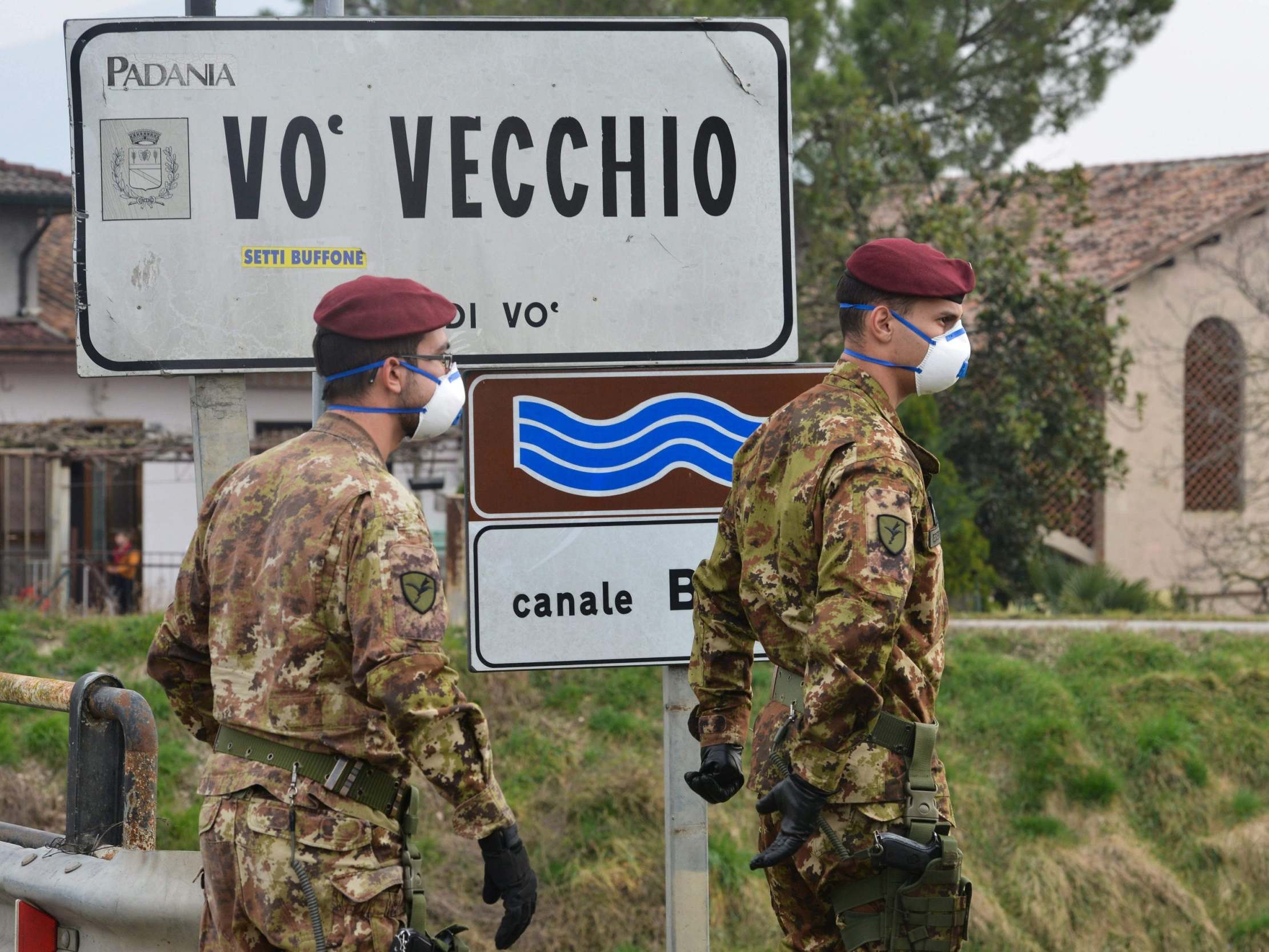 Italian soldiers at a?check-point in Vo Vecchio, a ‘red zone’ town (AFP/Getty)