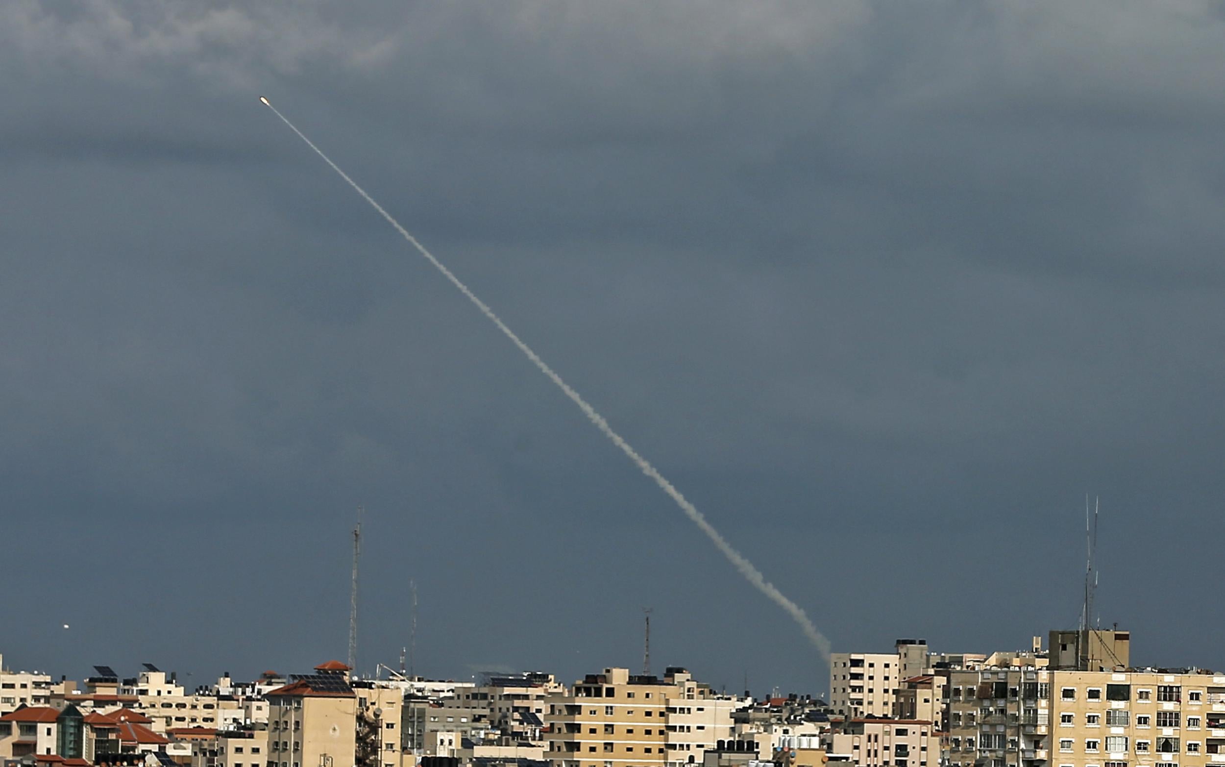 Smoke trails from a rocket fired by Palestinian militants over the Gaza Strip (AFP/Getty)