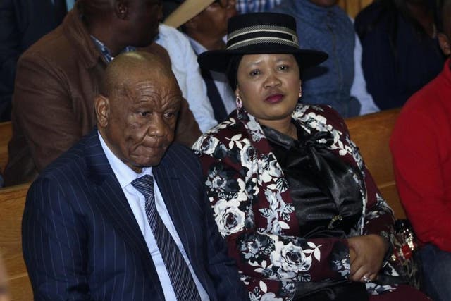 Lesotho's Prime Minister, Thomas Thabane, left, and his wife Maesaiah Thabane, right are seated in court, in Maseru on Monday 24 February 2020