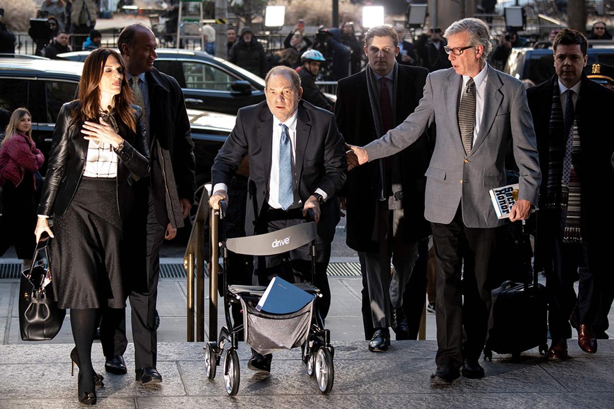 The movie mogul arrives at court in New York yesterday