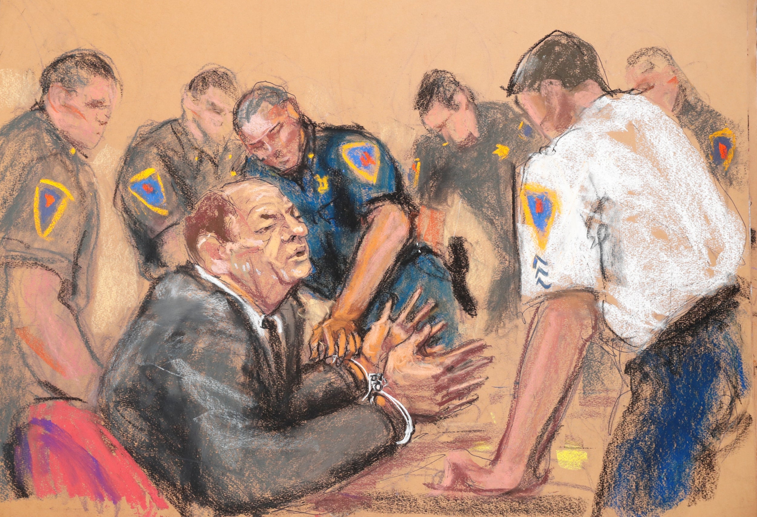 A court sketch showing Harvey Weinstein being handcuffed in court after being found guilty of sexual assault charges