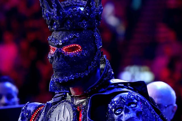 Deontay Wilder wore a three-stone costume into the ring ahead of his fight with Tyson Fury
