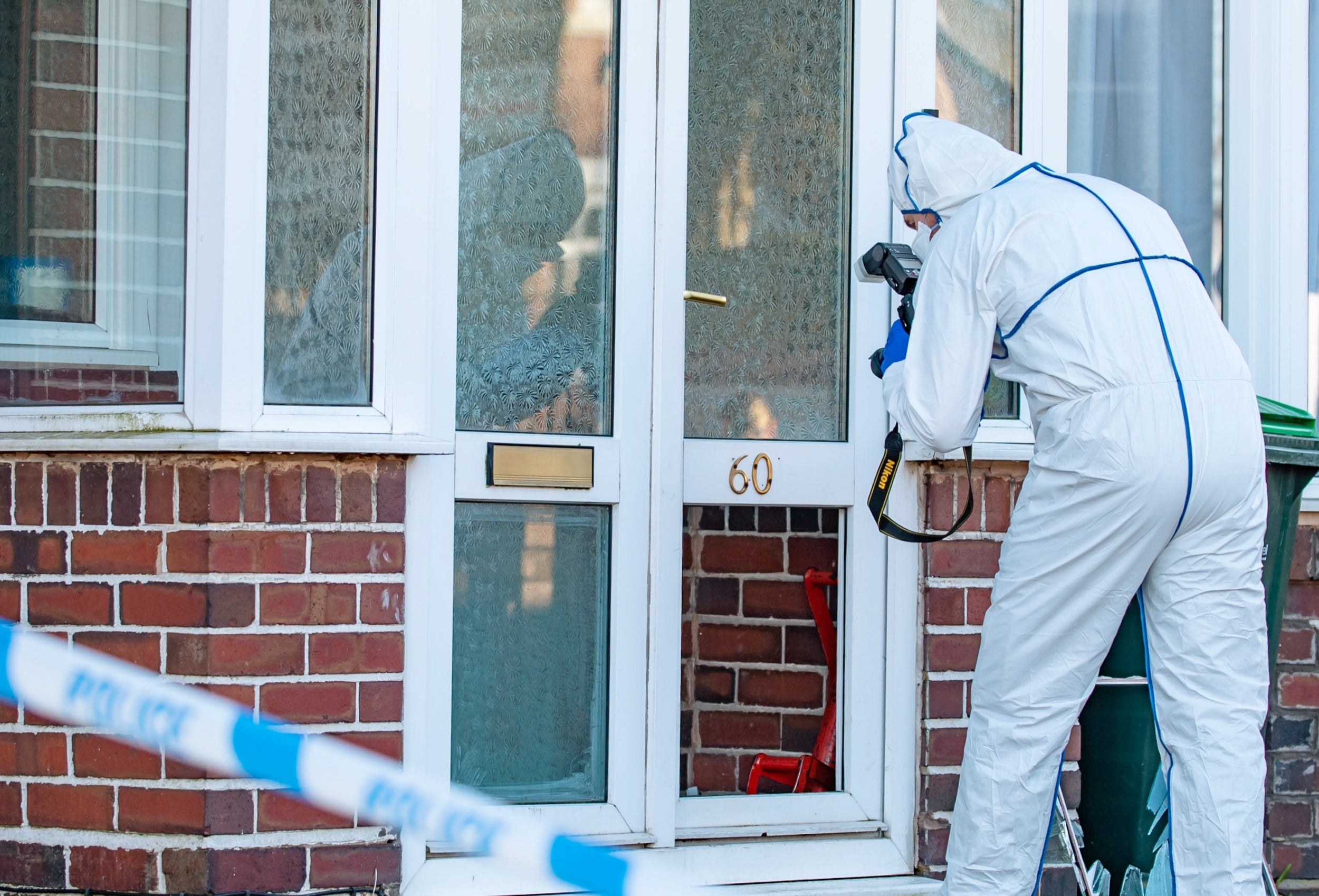 Police forensics at the murder scene in Moat Road, Oldbury