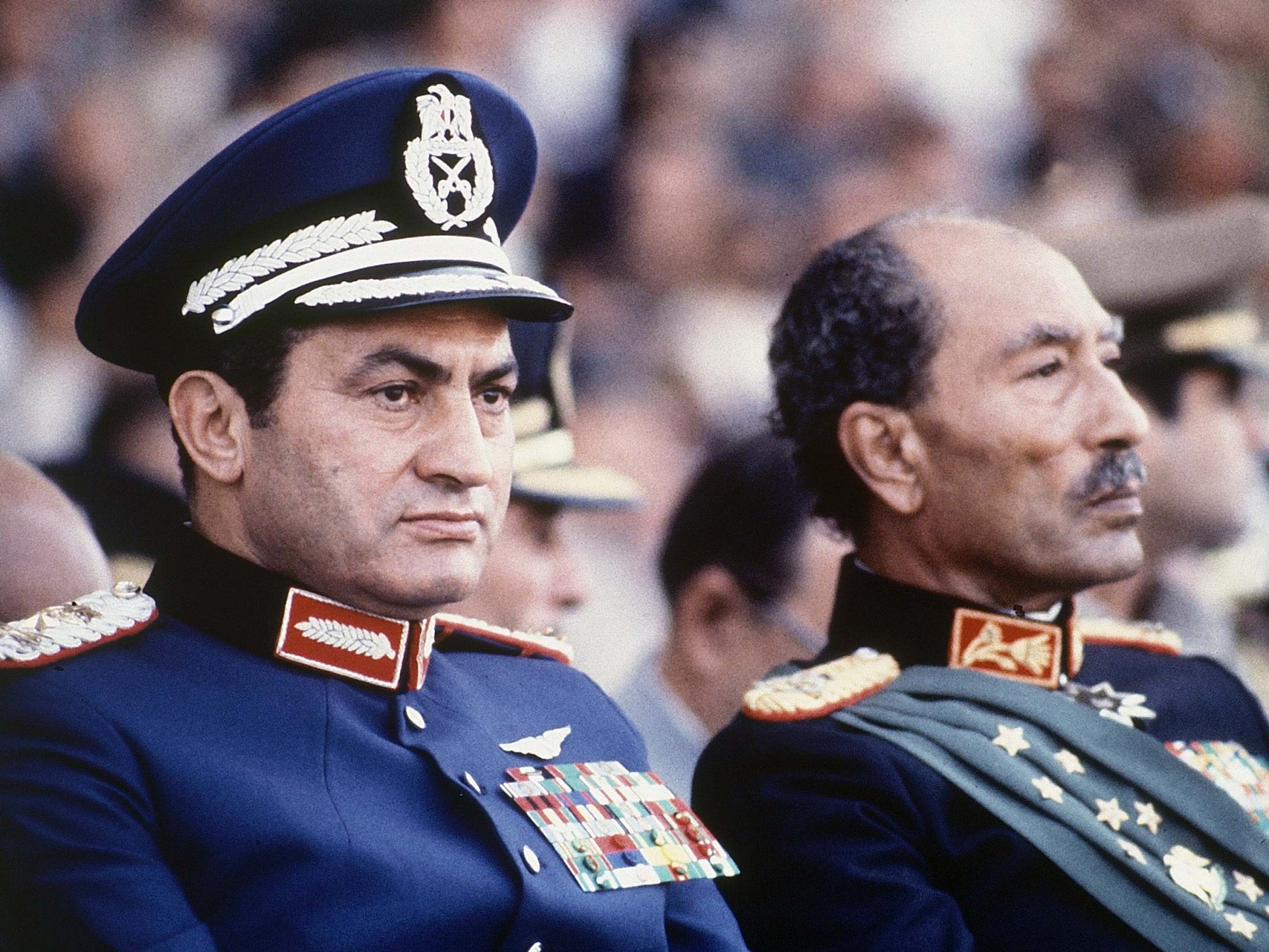 Vice President Mubarak (left) with President Anwar Sadat shortly before Sadat was assassinated by soldiers during a parade in Cairo in October 1981