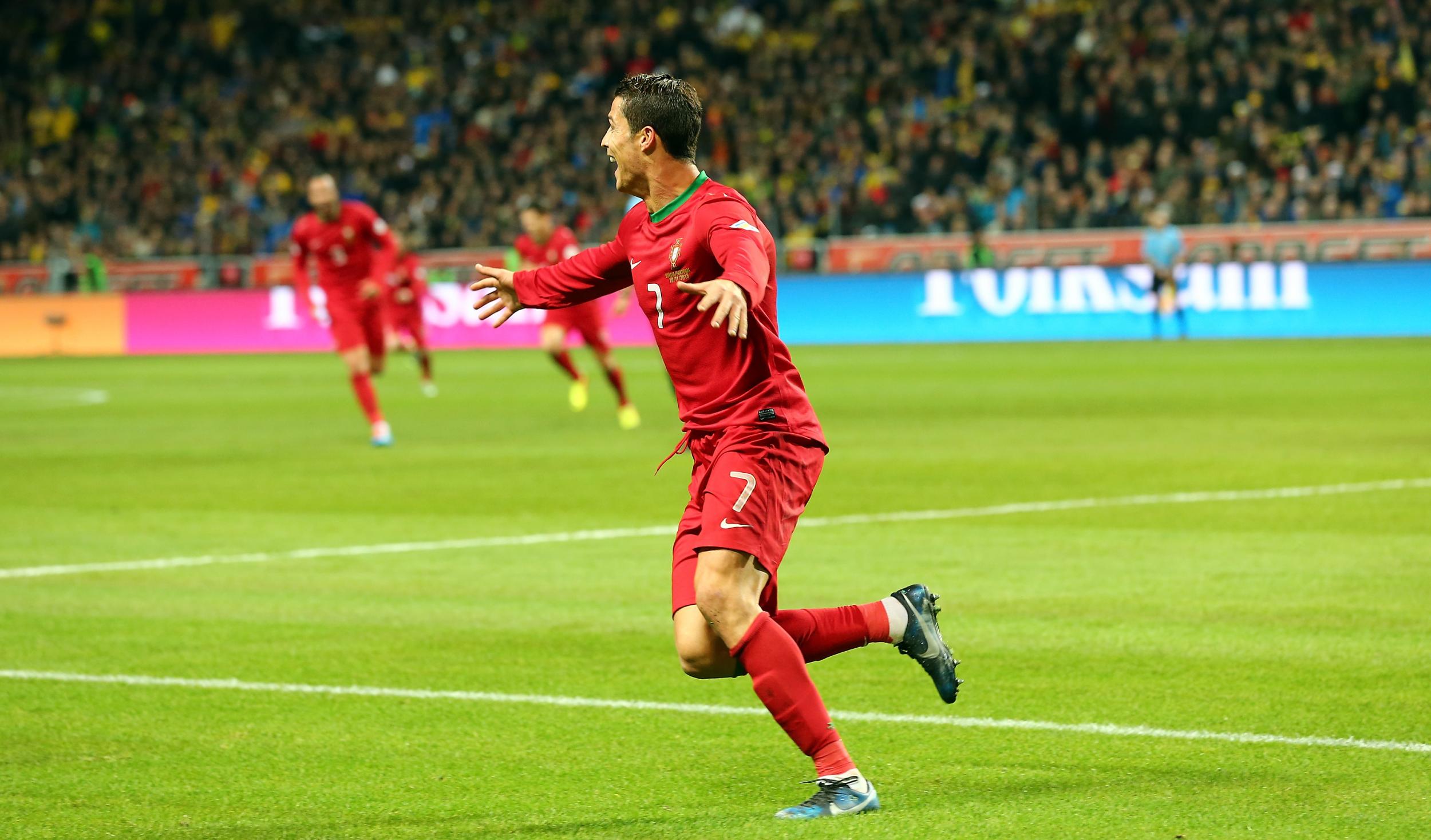 Ronaldo celebrates after scoring his hat-trick goal against Sweden (Getty )