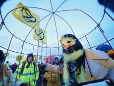 XR activists dress up as canaries to block mine in protest