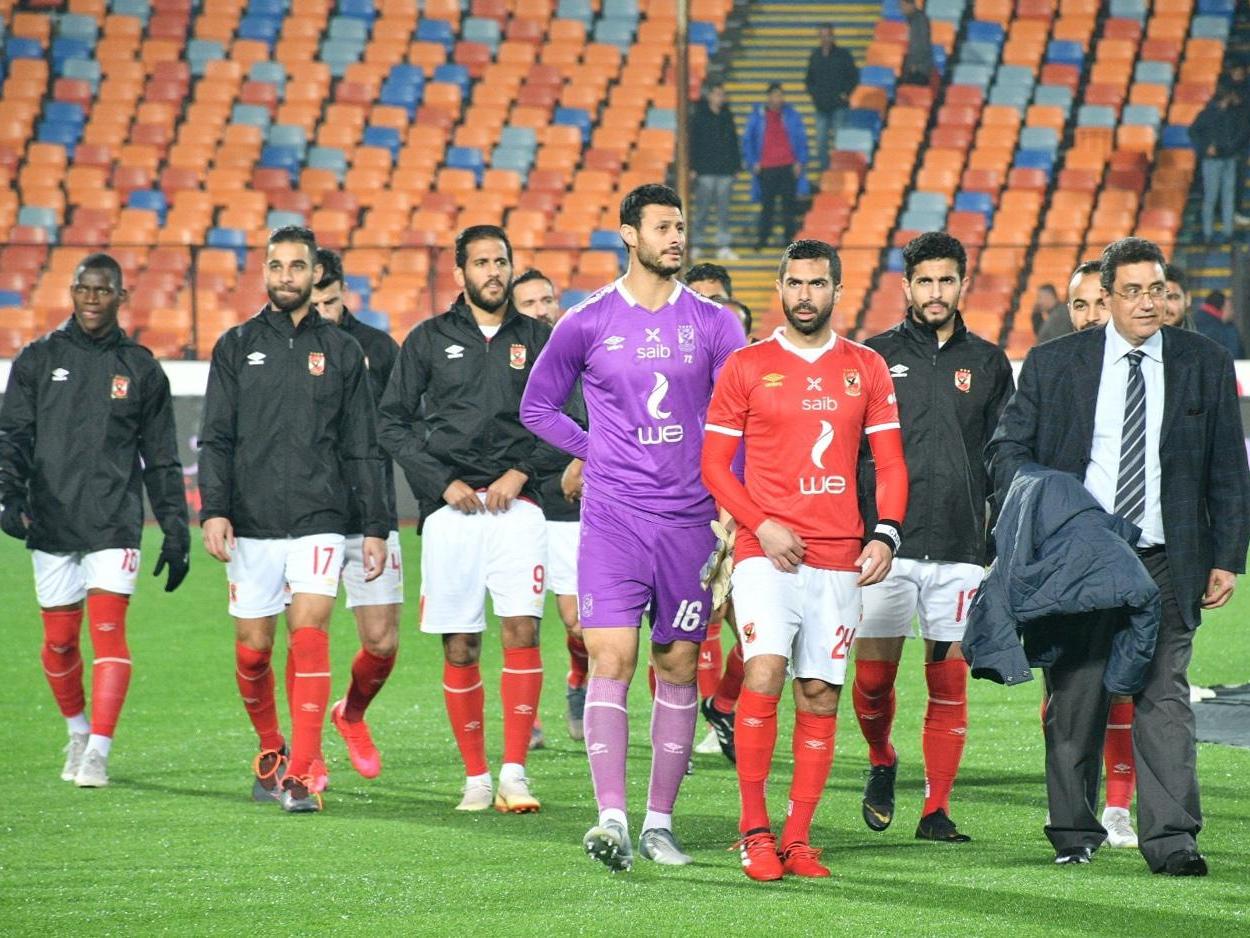 Ahly's players leave the pitch following the Egyptian league match between Al-Ahly and Zamalek at the Cairo International Stadium in the Egyptian capital on February 24, 2020