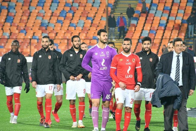 Ahly's players leave the pitch following the Egyptian league match between Al-Ahly and Zamalek at the Cairo International Stadium in the Egyptian capital on February 24, 2020