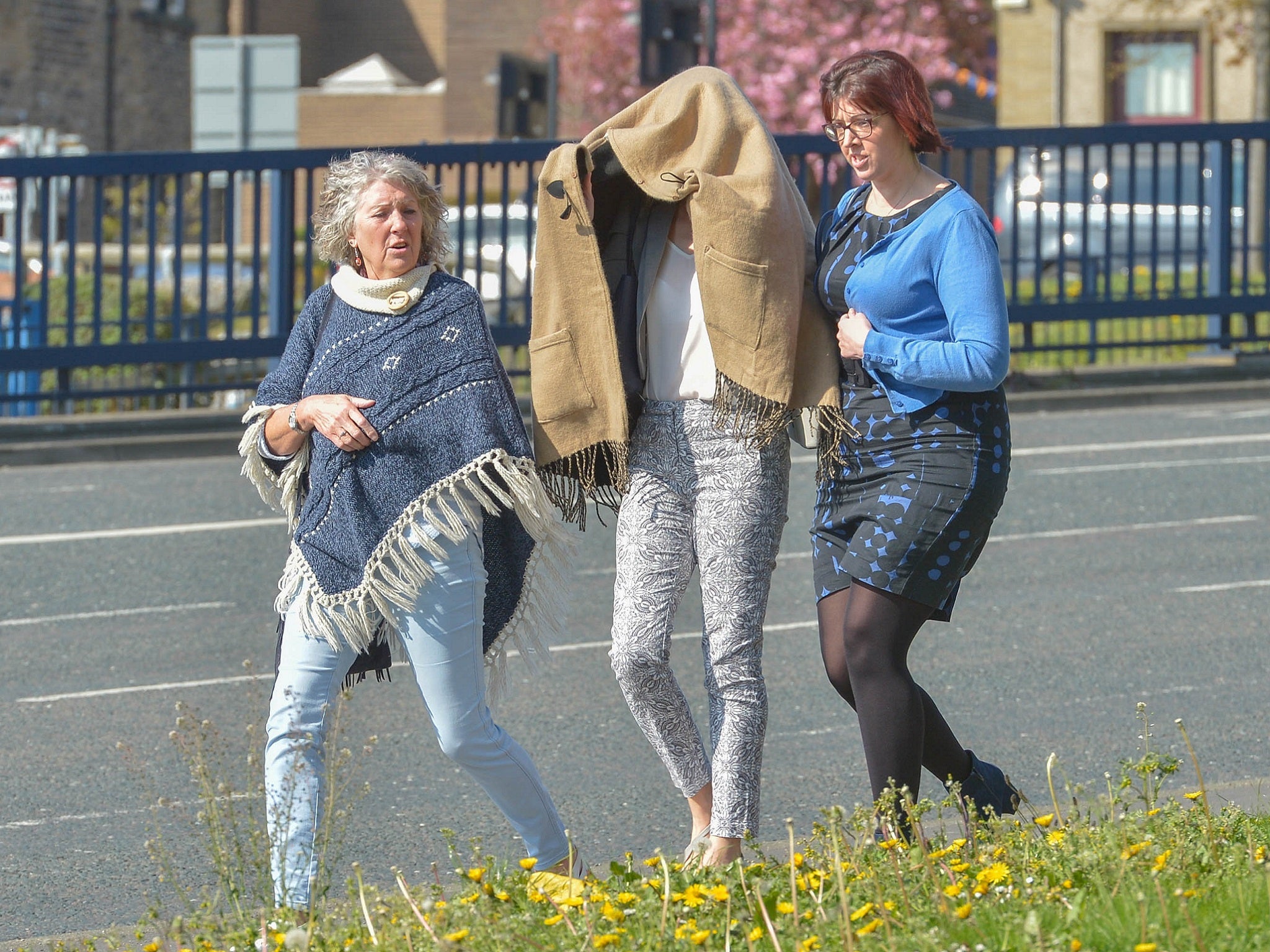 Sarah Higgins, 42, pictured centre leaving Huddersfield Magistrates' Court in April 2019, has been charged with manslaughter over the death of 10-month-old Skylar Giller in August 2017.