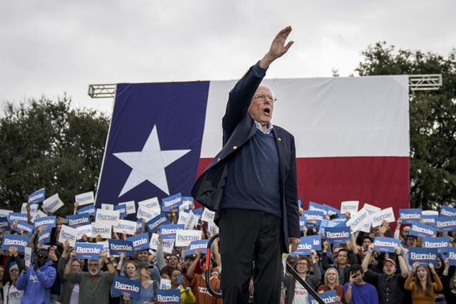 Bernie Sanders waves to supporters in Austin