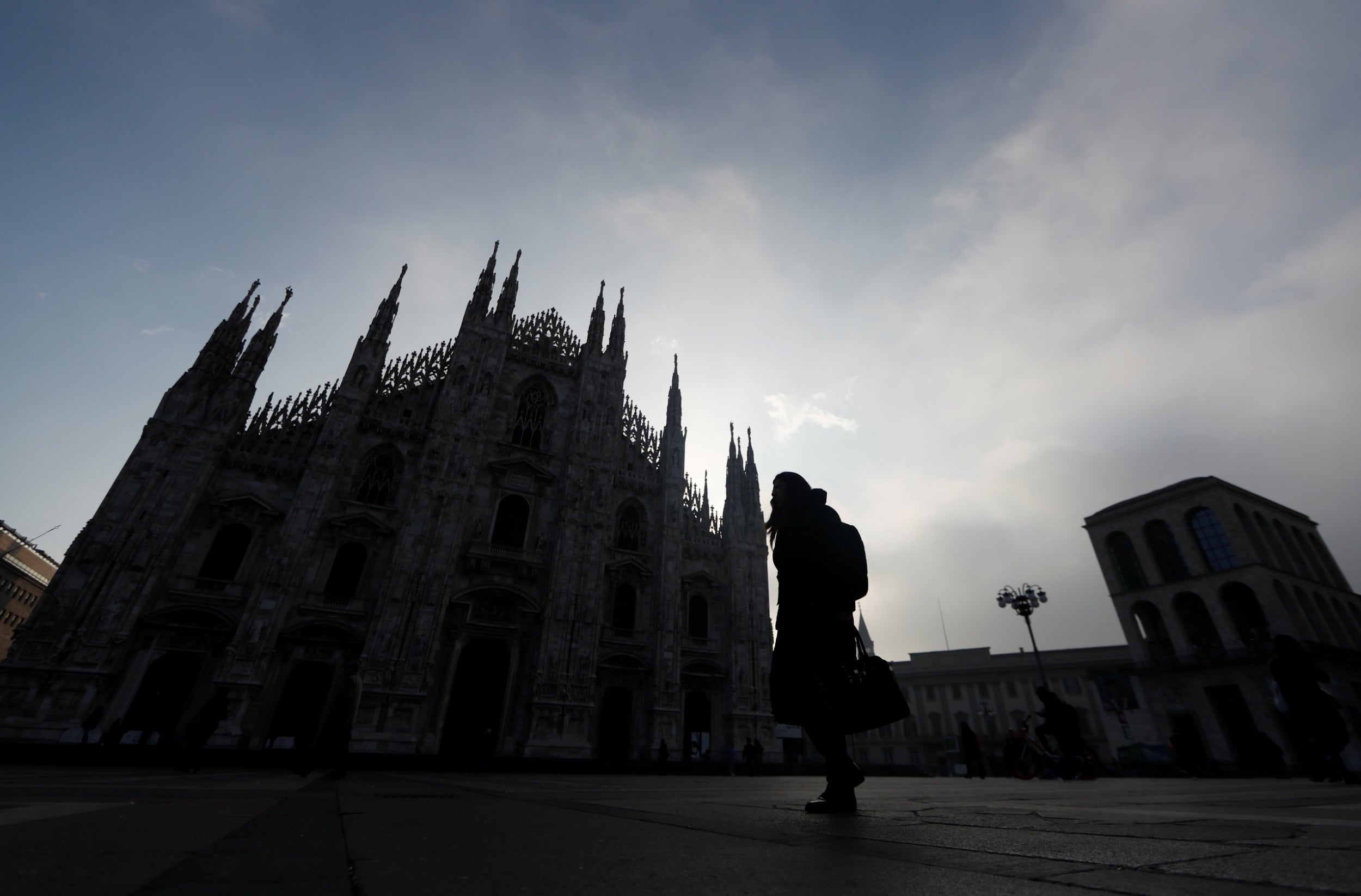 Piazza del Duomo in Milan, normally filled with tourists, stands empty as the coronavirus outbreak continues to grow