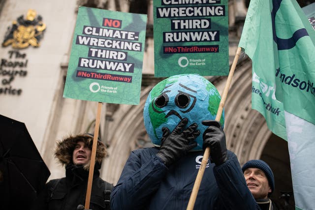 <p>Climate activists protest against plans for third runway at Heathrow</p>