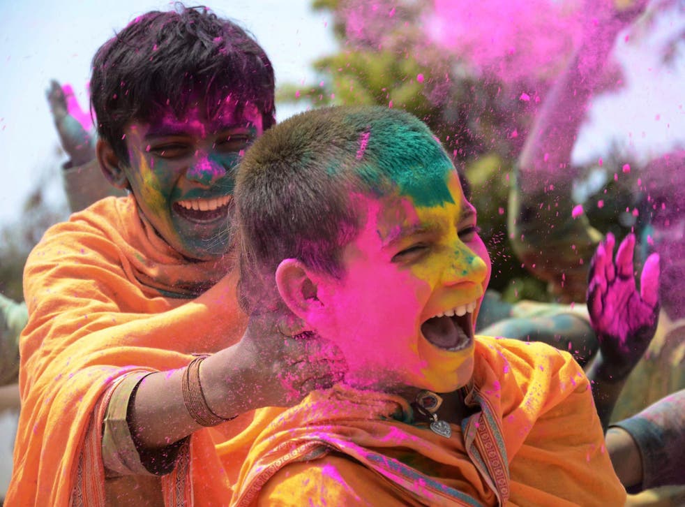 Students celebrate the festival of Holi in Jabalpur, in the Indian state of Madhya Pradesh