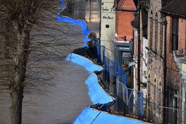 Temporary flood barriers which have been moved by the River Severn towards the Wharfage in Ironbridge, Shropshire, 26 February 2020.