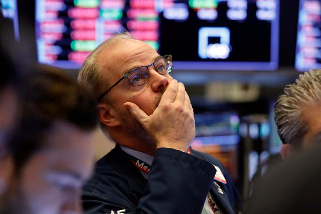 A trader on the floor of the New York Stock Exchange on Friday