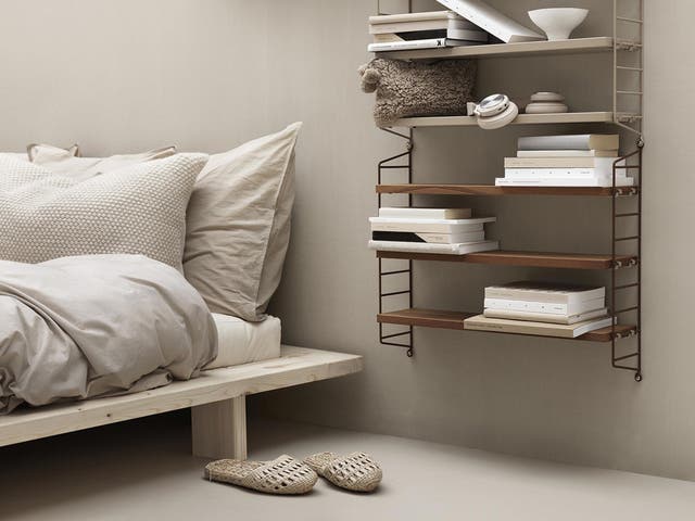 Another option for alternative generous bedside storage is wall-hung shelving