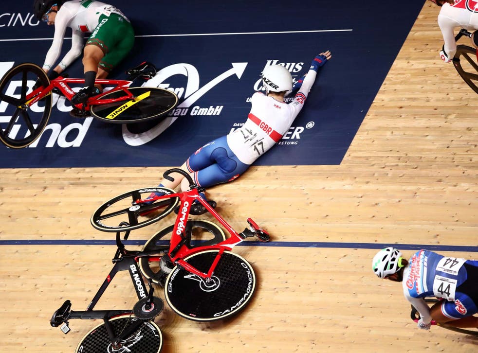 Great Britain's Laura Kenny crashes whilst riding the Women's Omnium Scratch Race