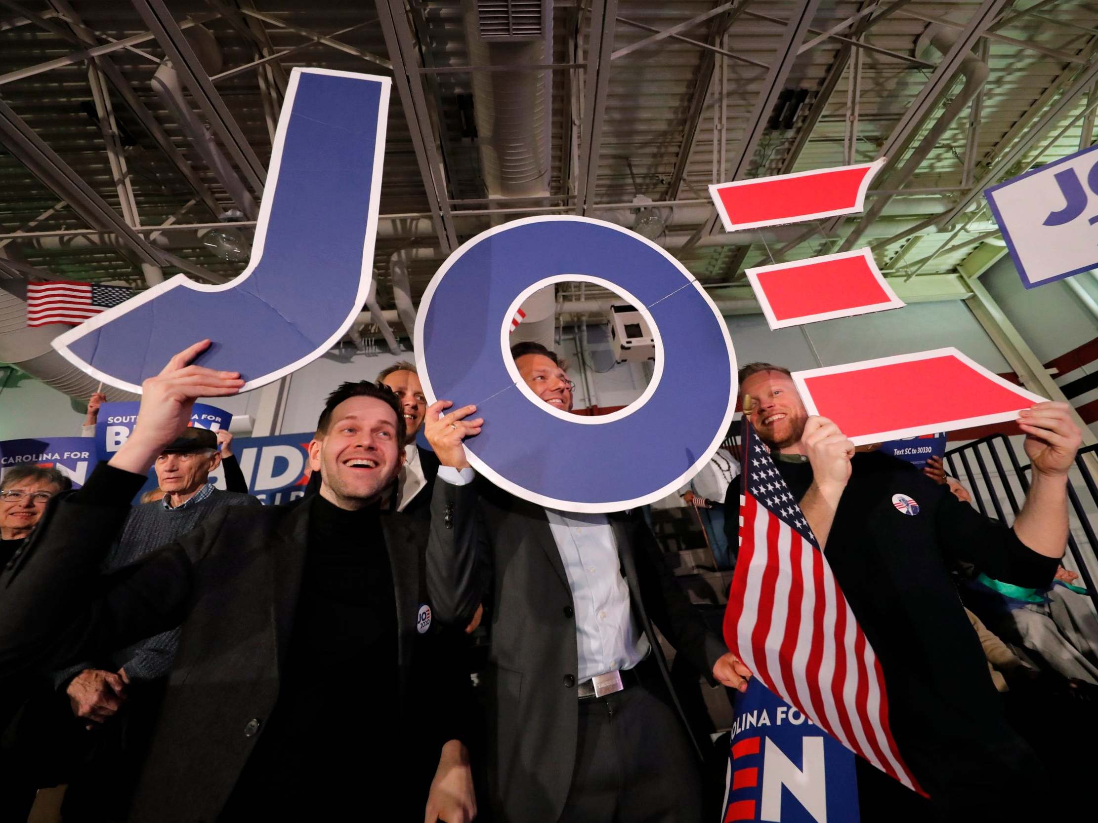 Supporters cheer at a primary election night rally for Democratic presidential candidate former vice president Joe Biden in South Carolina