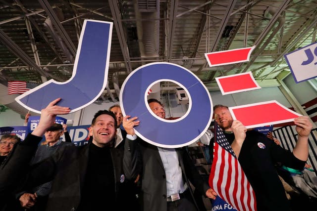 Supporters cheer at a primary election night rally for Democratic presidential candidate former vice president Joe Biden in South Carolina