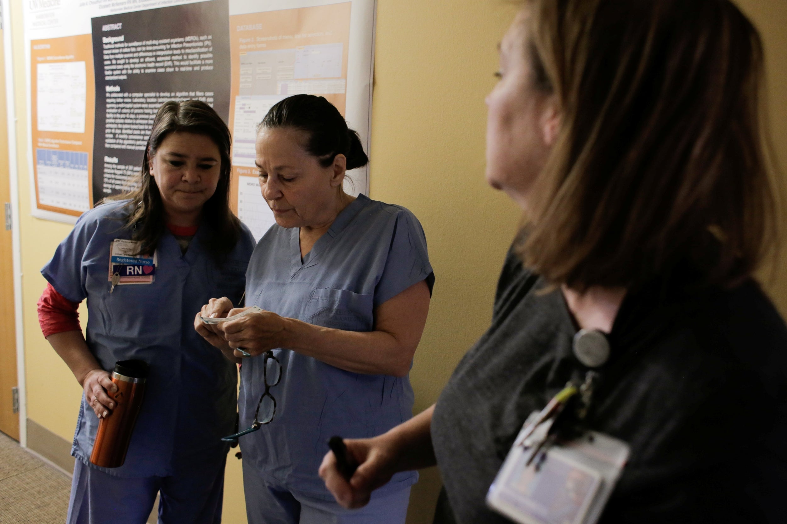 Members of the Harborview Medical Center's home assessment team prepare to visit a home potentially exposed to coronavirus