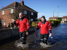 Heavy rain brings fresh flood fears and weather warnings to UK – live