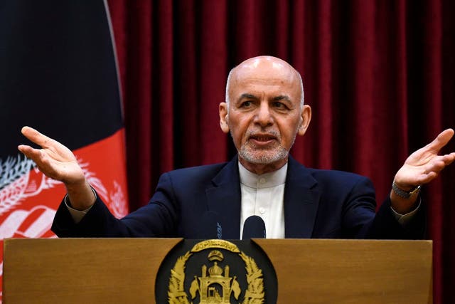 Ashraf Ghani speaks to reporters during a press conference at the presidential palace in Kabul the day after the US-Taliban deal was announced