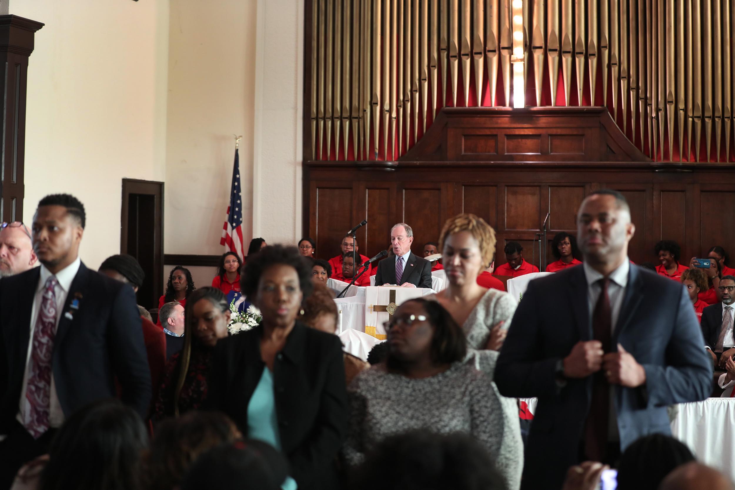 Churchgoers in Selma, Alabama turn their backs to presidential hopeful Michael Bloomberg.