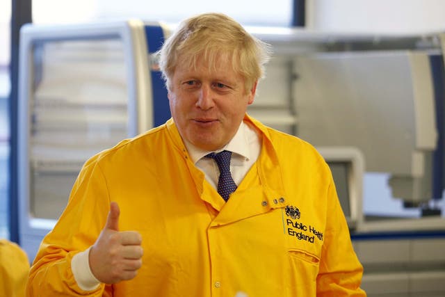 Boris Johnson visits a laboratory at the Public Health England National Infection Service in Colindale, north London