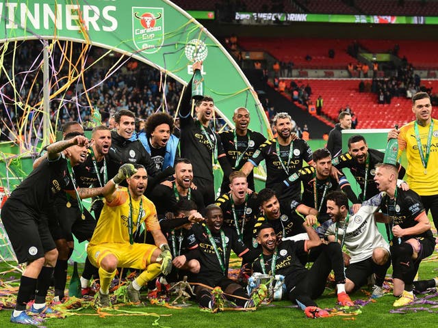 Manchester City's players celebrate with the Carabao Cup