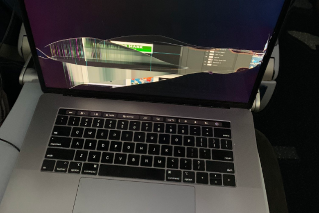 Pat Cassidy claims his MacBook was broken by the passenger in front