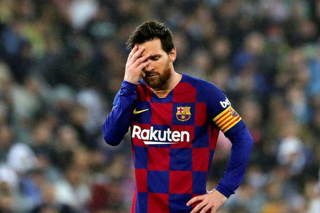 Lionel Messi reacts to Barcelona's El Clasico defeat