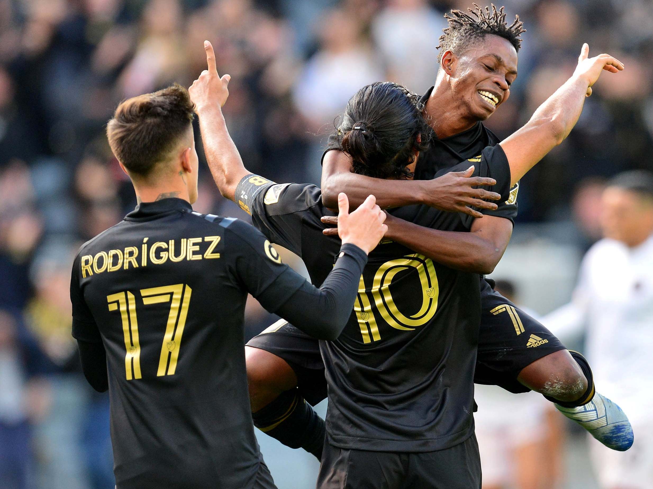 Carlos Vela, No 10, celebrates scoring for Los Angeles