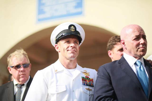 SAN DIEGO, CA - JULY 02:R, Navy Special Operations Chief Edward Gallagher celebrates after being acquitted of premeditated murder at Naval Base San Diego July 2, 2019 in San Diego, California. Gallagher was found not guilty in the killing of a wounded Islamic State captive in Iraq in 2017. He was cleared of all charges but one of posing for photos with the dead body of the captive.