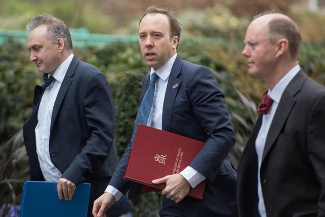 Health Secretary Matt Hancock (centre) and Chief Medical Officer Chris Whitty (right) on their way to the government's emergency committee Cobra to discuss coronavirus on March 2, 2020.