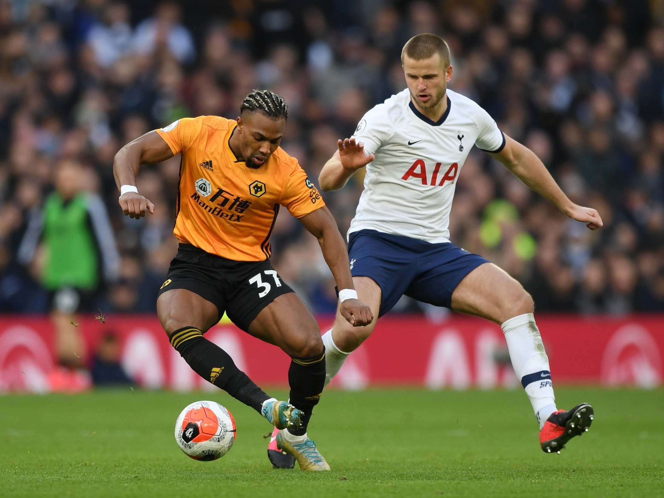 Adama Traore of Wolverhampton Wanderers battles for possession with Eric Dier of Tottenham Hotspur
