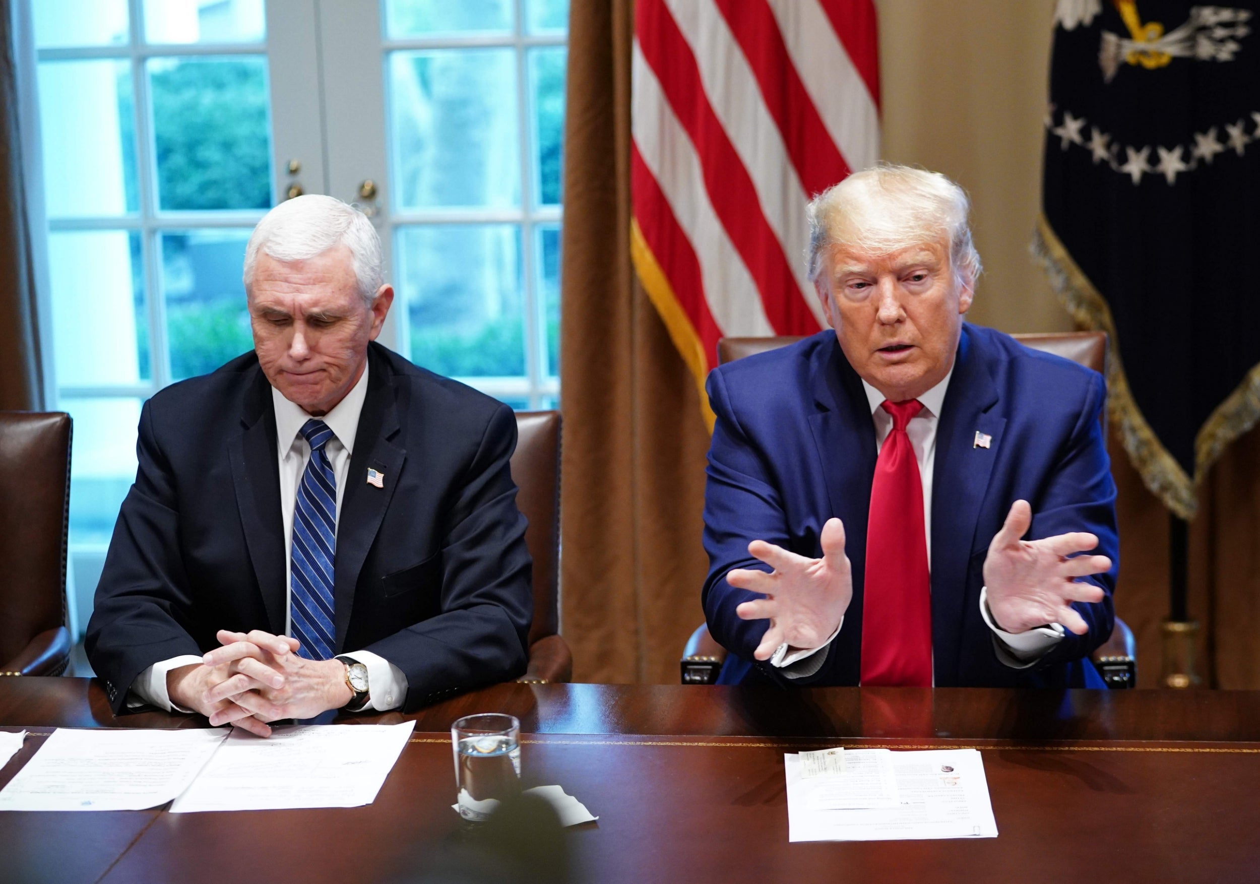 Donald Trump and Mike Pence at a meeting with pharmaceutical executives in the Cabinet Room of the White House to discuss the coronavirus crisis
