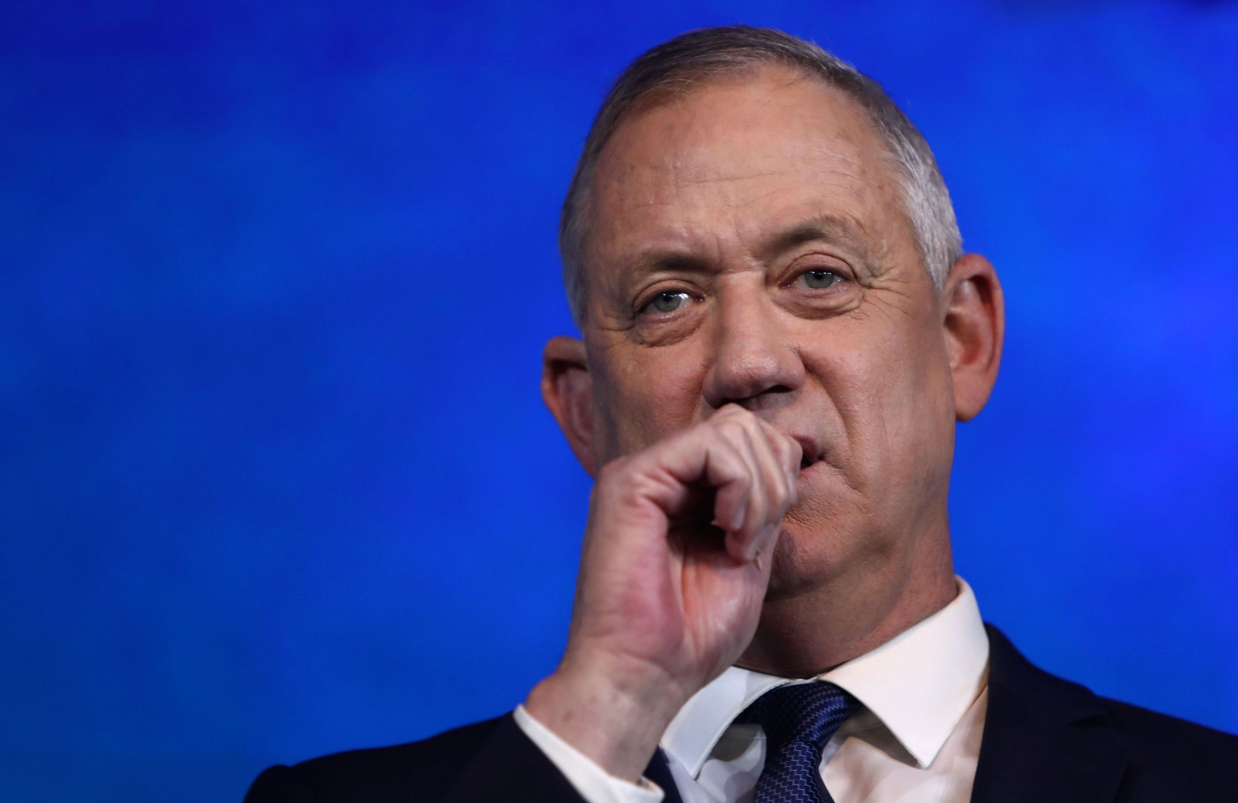 Benny Gantz, leader of the Blue and White (Kahol Lavan) alliance, addresses supporters at their headquarters