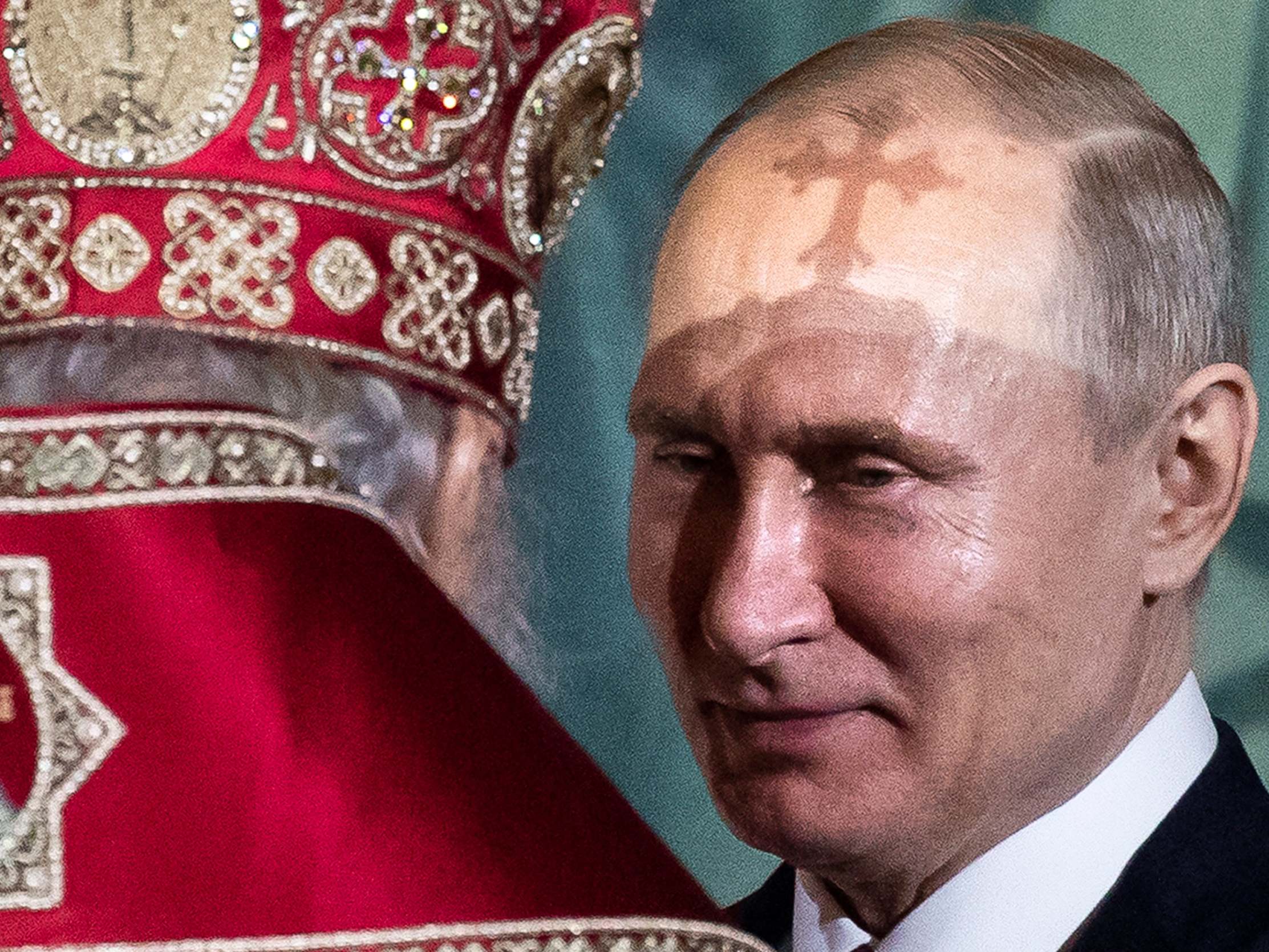 Vladimir Putin, pictured talking to the Russian Orthodox Patriarch Kirill of Moscow, has proposed constitutional amendments including a mention of God and effectively a ban on same-sex marriage
