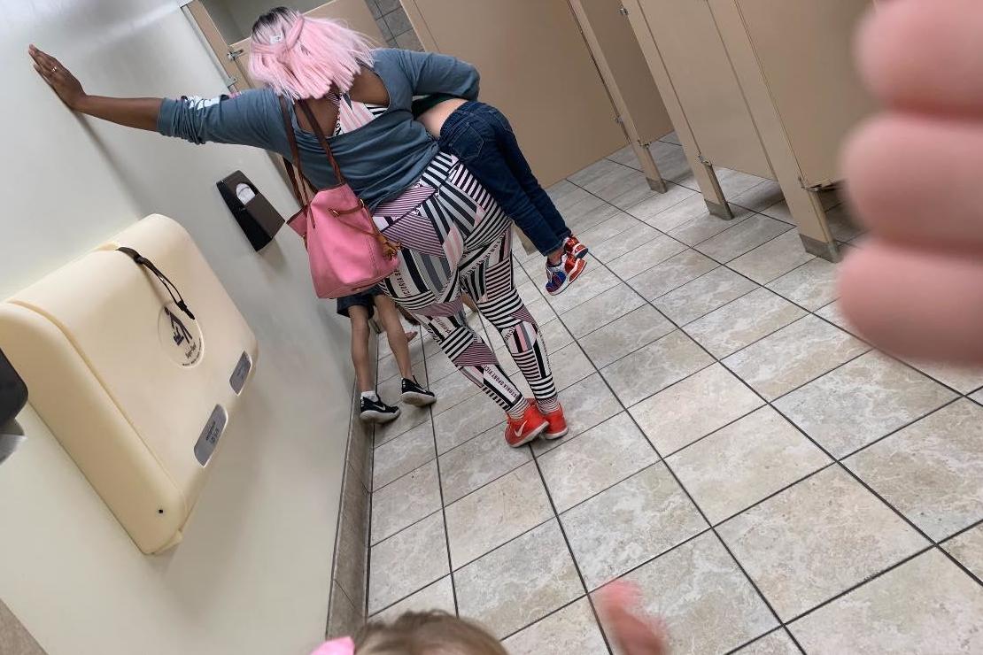 Mother defends getting son to do push-ups in bathroom after photo goes