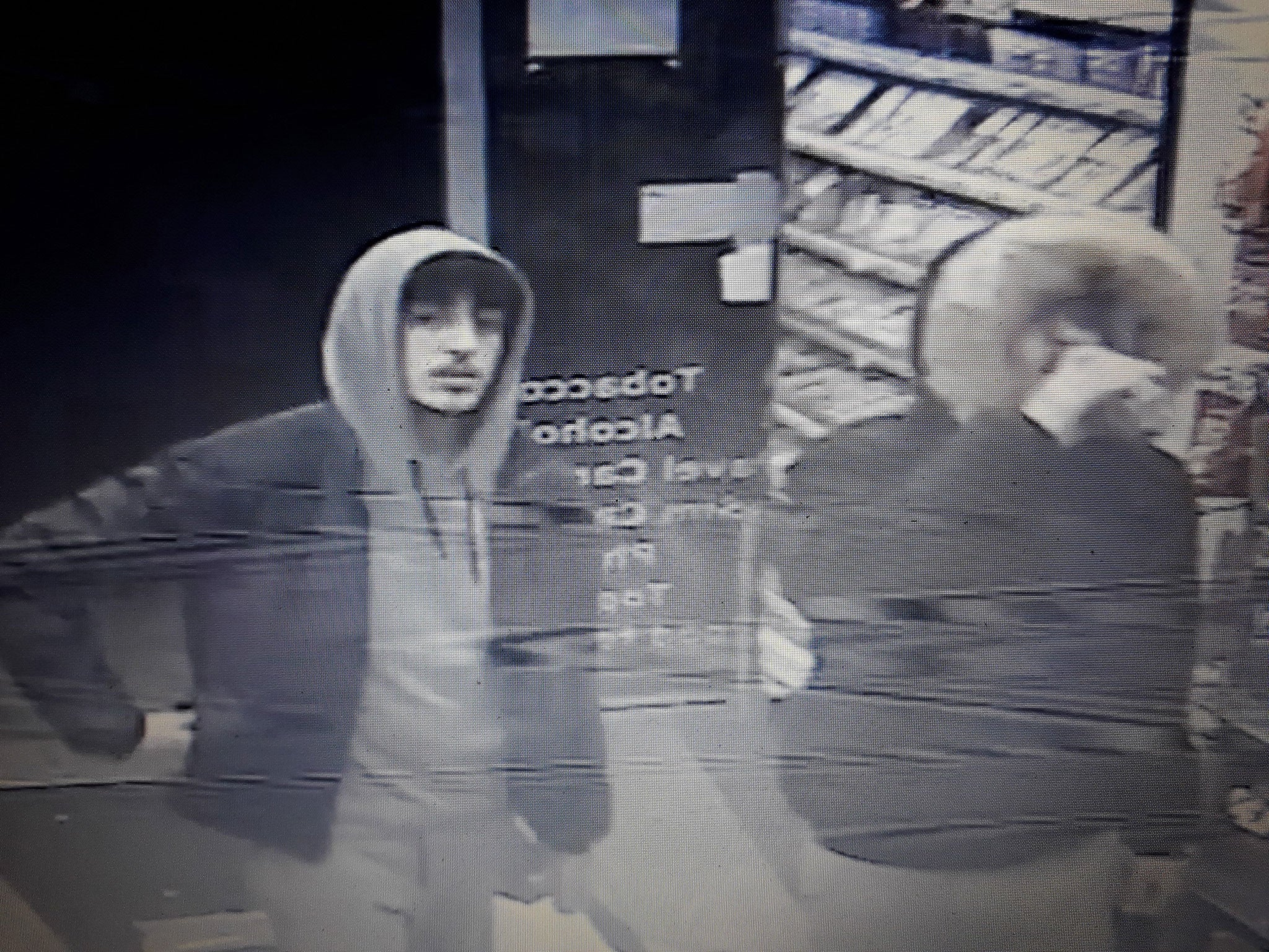 Two of the four men police want to speak to over a racially-aggravated attack in Oxford Street on 24 February