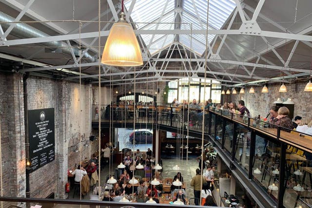 The Duke Street Market is in a rejuvenated old warehouse that’s kept the aesthetic inside too 