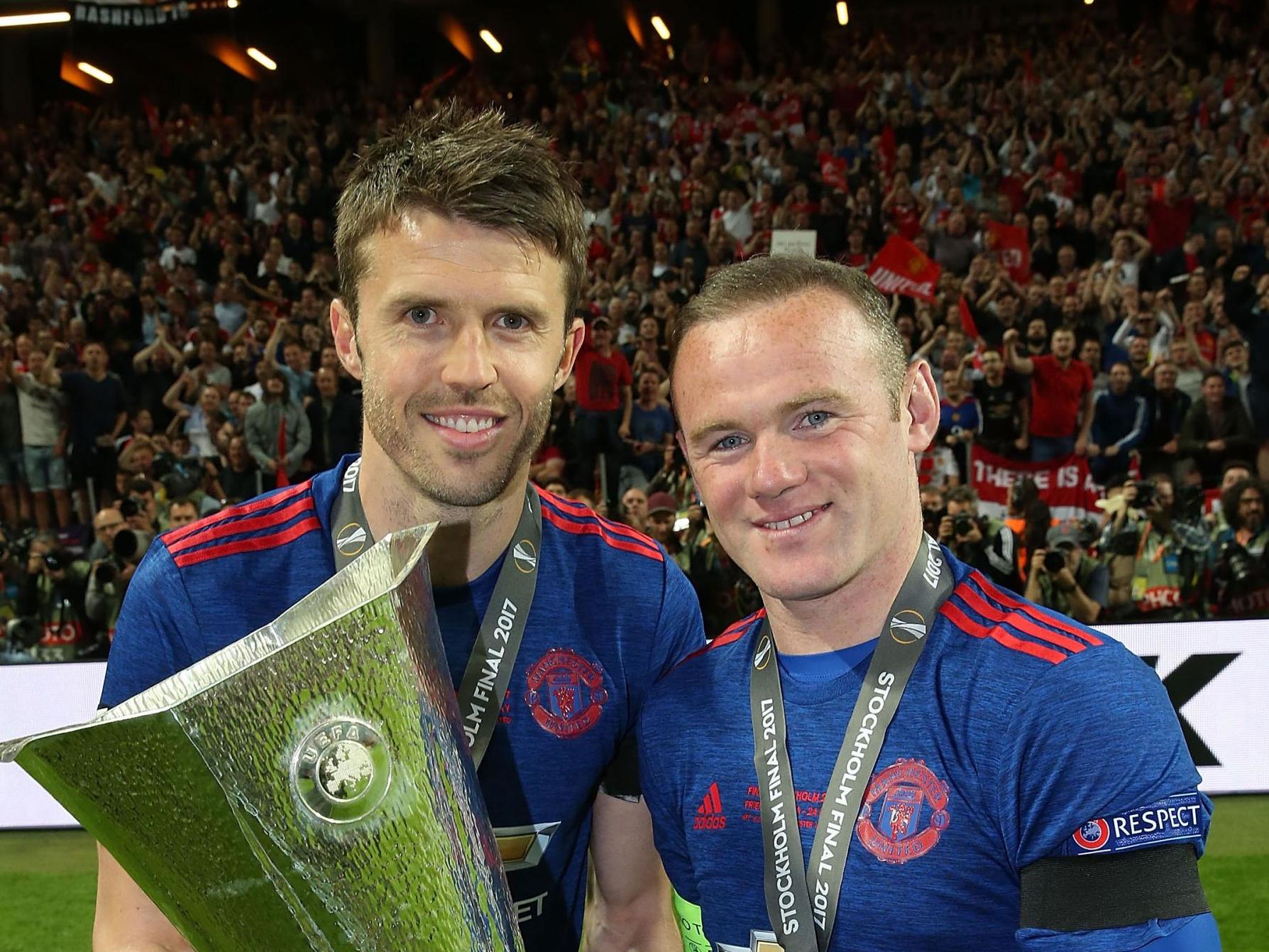 Michael Carrick and Wayne Rooney of Manchester United