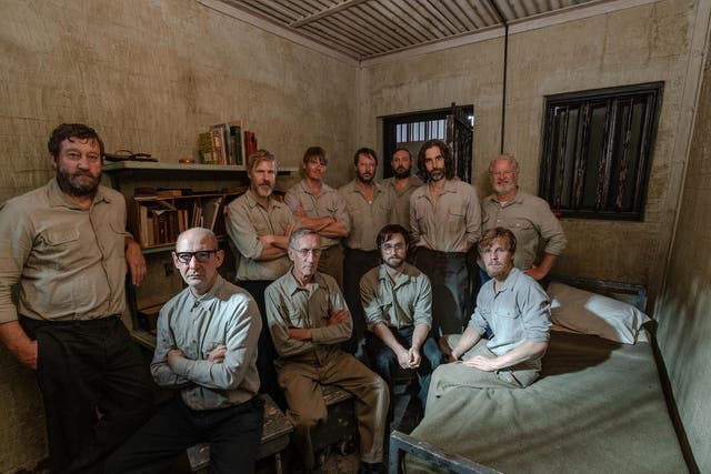 Tim Jenkin (seated second from left) with Daniel Radcliffe, who plays him in the movie, and other cast members