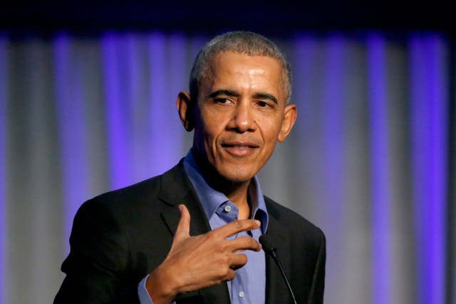 Former President Barack Obama address the participants at a summit on climate change in Chicago