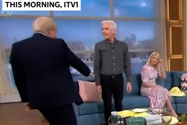 Philip Schofield tried keeping his hands by his side to avoid shaking Prime Minister Boris Johnson's hand