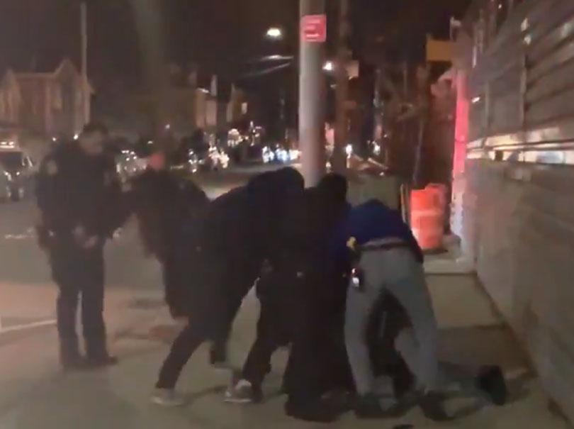 &apos;Help me!&apos;: Outrage over aggressive police arrest of black man in Brooklyn, after officer refuses to say what crime he has committed